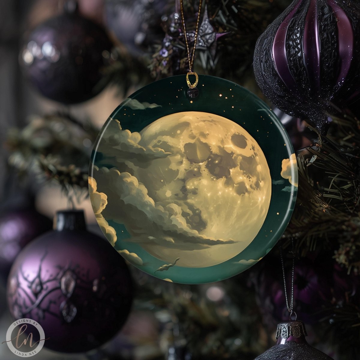 a close-up of a decorative ornament with a moon and clouds design, hanging on a Christmas tree.