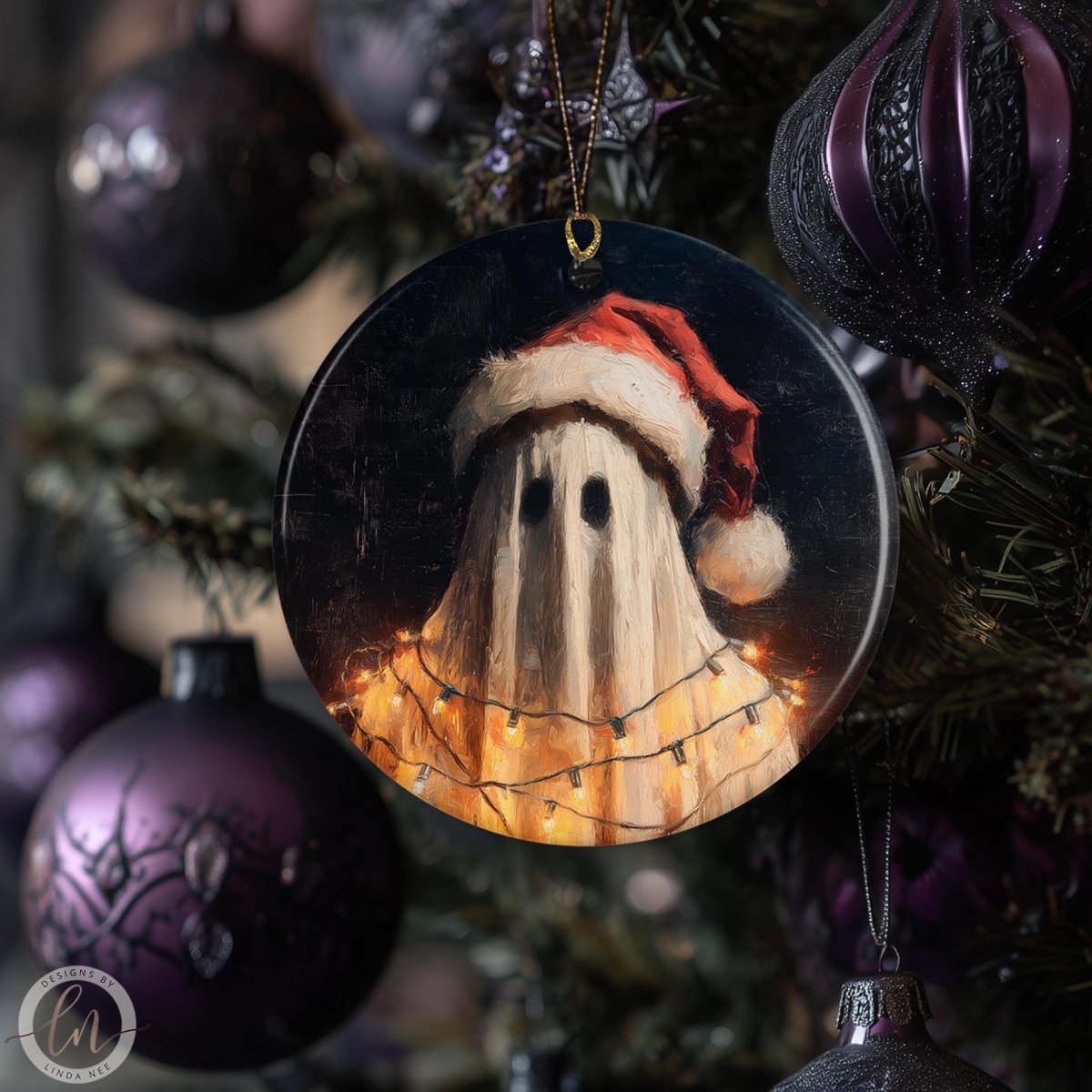 a Christmas tree decorated with ornaments, including a round ornament with a ghost wearing a Santa hat and a string of lights.