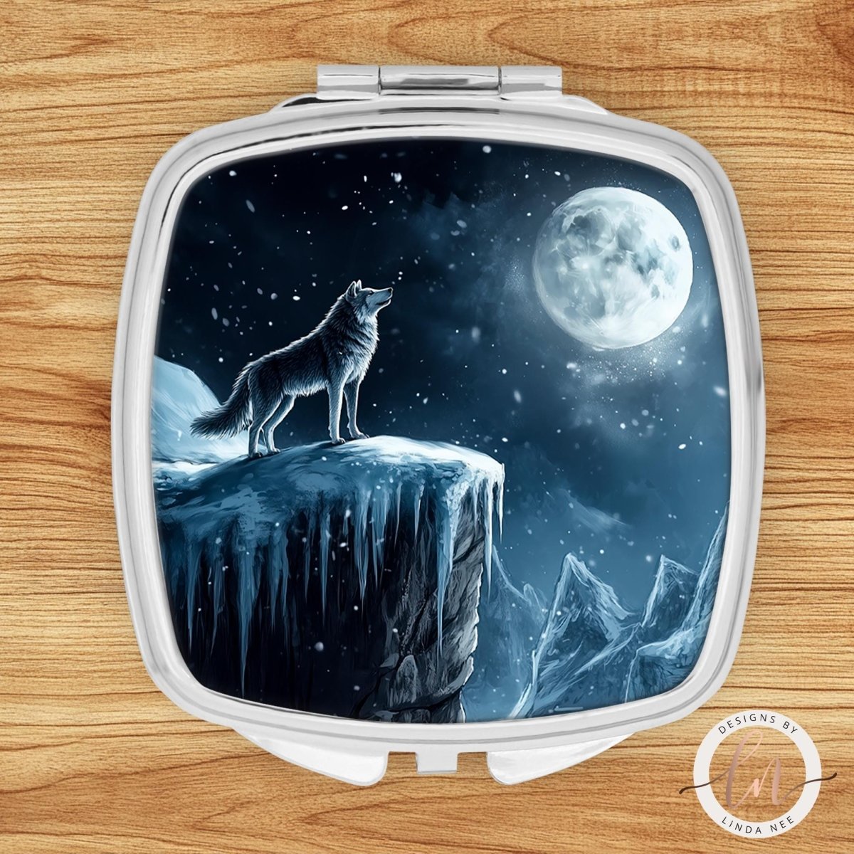 Howling wolf compact mirror with winter moon scene on silver square case