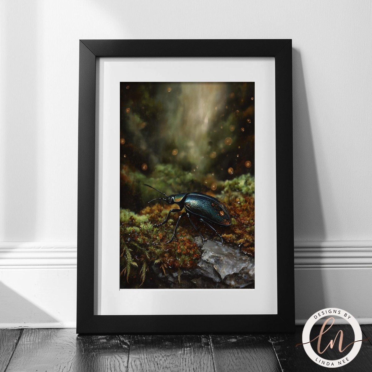 A framed photograph of a beetle resting on moss and rocks, with a blurred background of greenery and light.