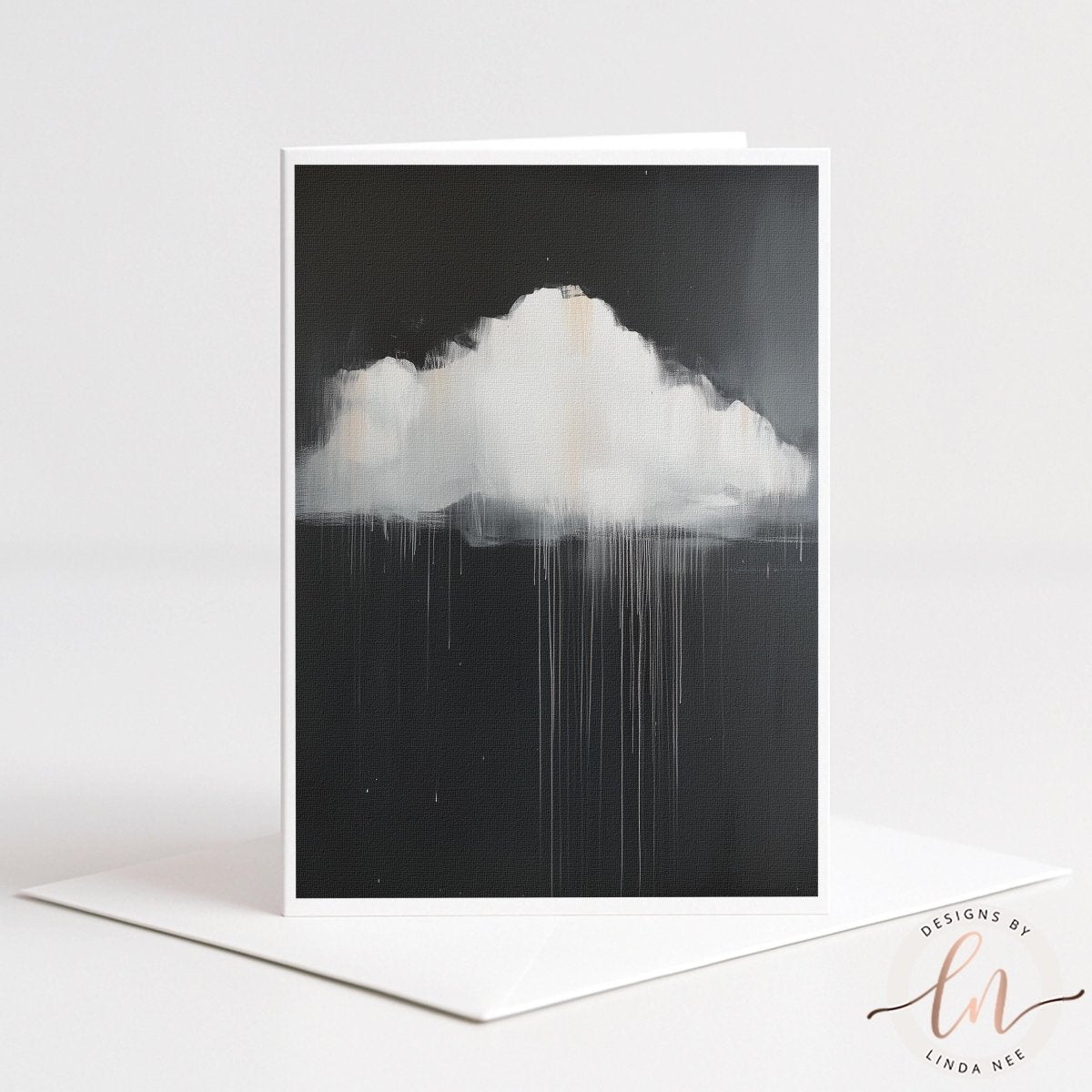 The image is a black and white photograph of a cloud with dripping or dripping lines, creating a sense of movement and energy.