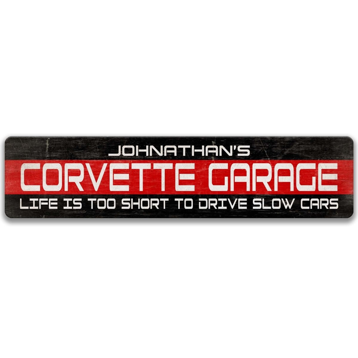 a sign with the text "Johnathan's Corvette Garage" in a bold, red font. The sign also includes the phrase "Life is too short to drive slow cars" in smaller white font.