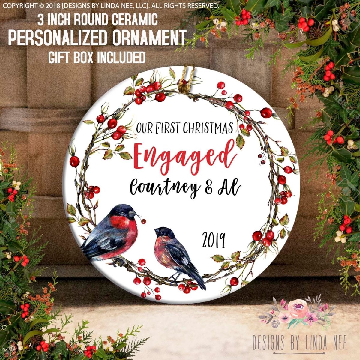 Personalized Christmas ornament with birds and wreath design, featuring text 'Our First Christmas Engaged Courtney & Al 2019'.