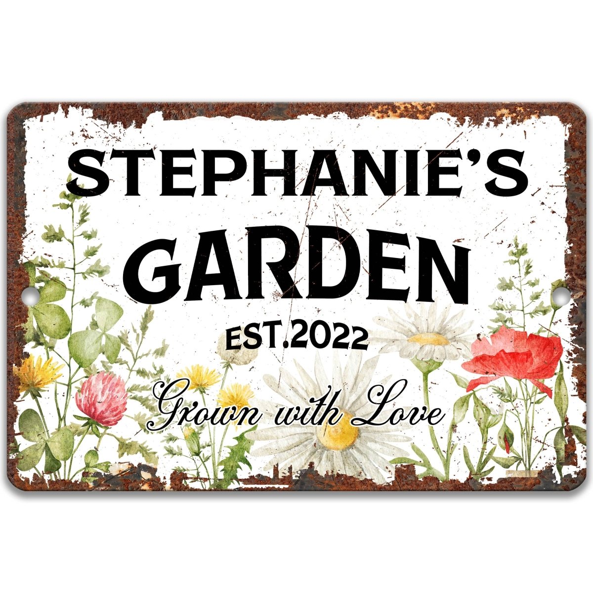 The image is a personalized garden sign that reads "Stephanie's Garden" and "Est.2022". The sign features a variety of flowers and plants surrounding the text.