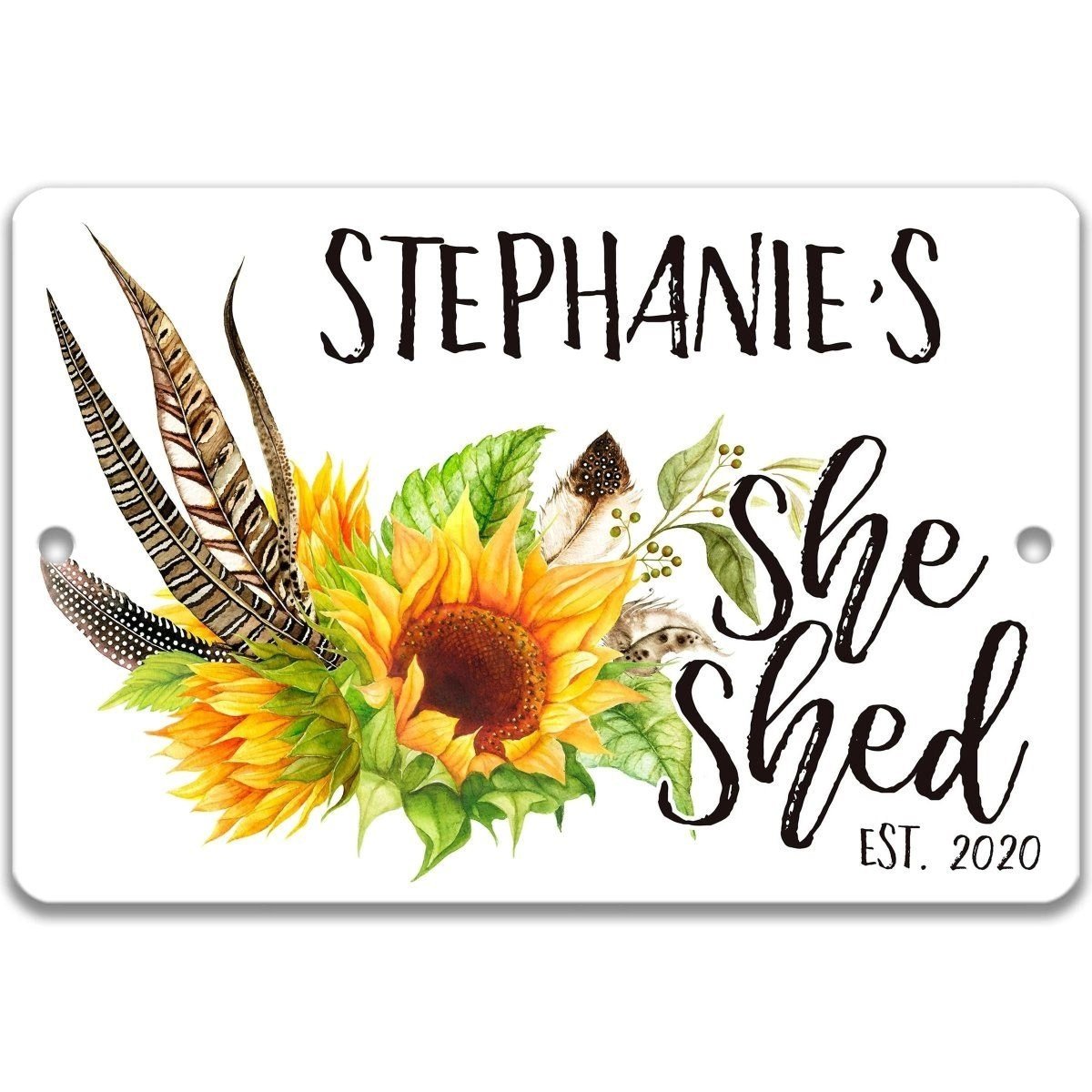 a sign with a sunflower and feathers, along with the text "Stephanie's She Shed Est. 2020".