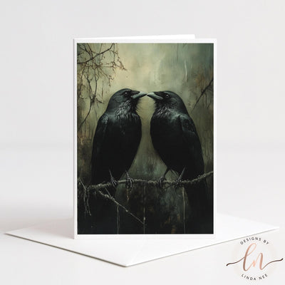 two black birds perched on a branch, facing each other and appearing to be in a close, intimate interaction.