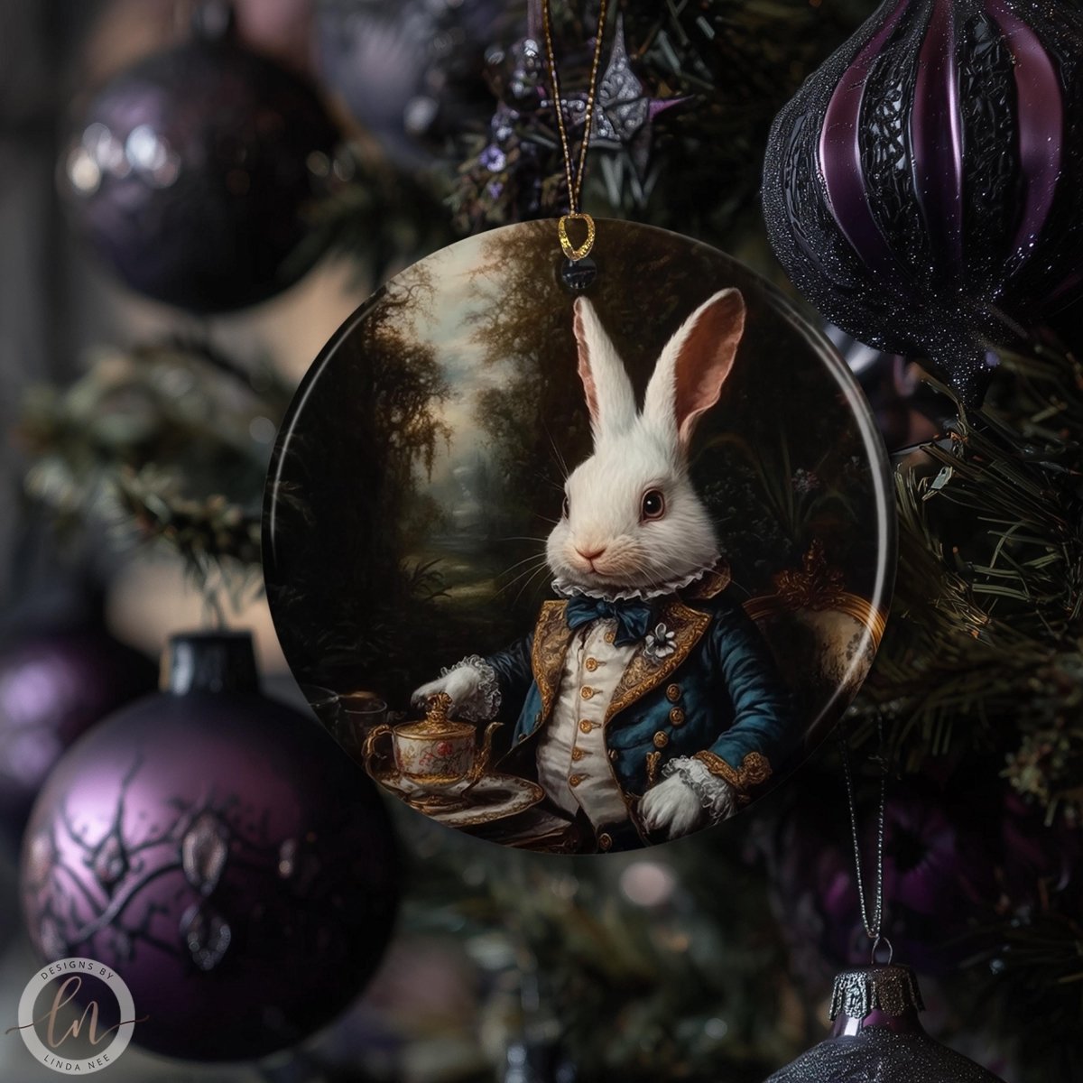 A decorative ornament featuring a white rabbit wearing a blue coat and holding a teapot, surrounded by other ornaments on a Christmas tree.