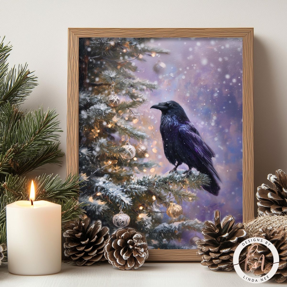A framed photograph of a black crow perched on a snow-covered branch of a Christmas tree, with a lit candle and pine cones nearby.