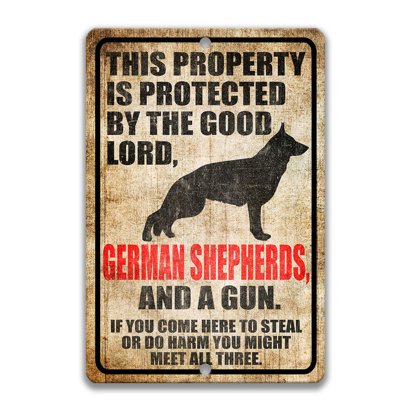 Lord, German Shepherds and a Gun Sign
