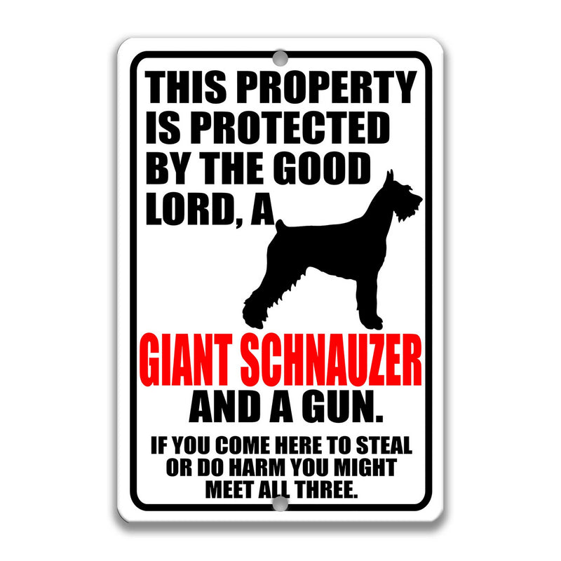 Lord, Giant Schnauzer and a Gun Sign 