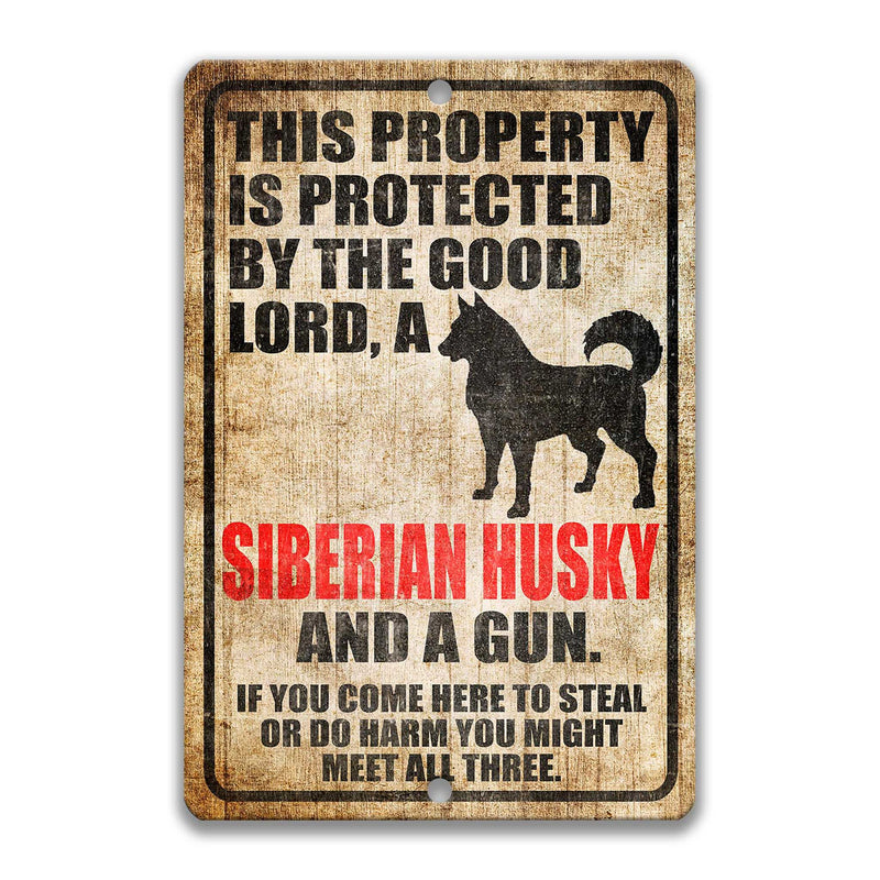 Lord, Siberian Husky and a Gun Sign