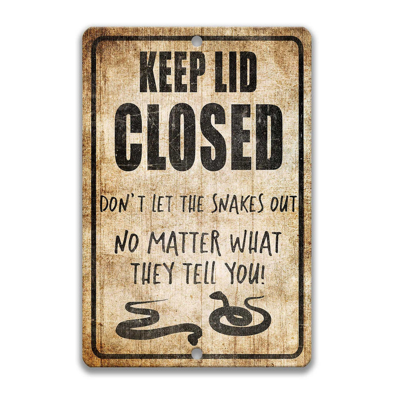 Keep Lid Closed Snakes Sign