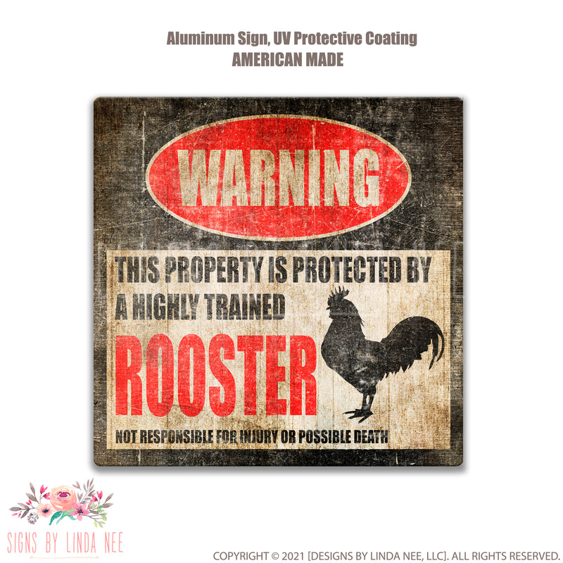 Distressed look background with font saying Warning This Property is Protected by a Highly trained Rooster Not responsible for injury or possible death Square sign Rooster 